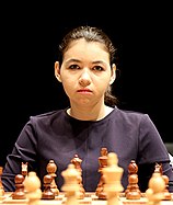 Aleksandra Goryachkina staring while playing chess