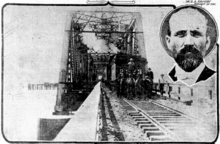 A train crosses a bridge.