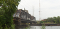 The Baltimore and Ohio Railroad Bridge, built in the late 19th or early 20th century as a two track, swing bridge across the Schuylkill River in the Grays Ferry neighborhood in Philadelphia, Pennsylvania. Now a CSX Philadelphia Subdivision bridge. View from the west river bank, looking northeast.
