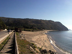 The beach of Case del Conte (right) seen from the nearby Ogliastro Marina (left)