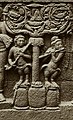 9th century C.E. Stick zither and flute played by kinnaras, from the relief of the hidden base of Borobudur - 1890-1891. The kinnara is pressing the gourd resonator into his chest. The end of the stick zither resembles a bird.
