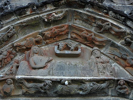 The tympanum over the south porch entrance depicting the nativity.