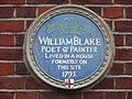 Plaque on William Blake Estate building in Hercules Road, marking the location of the artist and poet William Blake's former house.