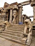 Vittala temple complex: iv) Ruined Gateway with Lofty Pillars to the West of Vittala Temple