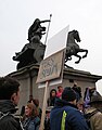 "Tory scum" protest placard in a march as it passes the statue of Boadicea and Her Daughters in London