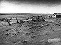 Image 5 Dust Bowl Photo credit: Sloan, USDA Buried machinery in a barn lot, Dallas, South Dakota, United States, due to Dust Bowl conditions, May 1936. Dust storms from 1930–1939 caused major ecological and agricultural damage to American and Canadian prairie lands. This ecological disaster was a result of drought conditions coupled with decades of extensive farming using techniques that promoted erosion. More featured pictures