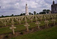 View of Lantern Tower and some of the many headstones at Notre Dame de Lorette