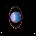 False-color image of Uranus, its rings and some of its moons