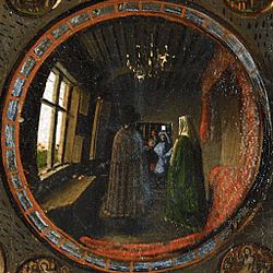 ☎∈ Undistorted reflection in the mirror in the painting The Arnolfini Portrait by Jan van Eyck.