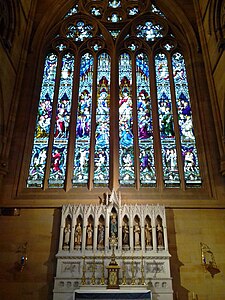 Chapel of Our Lady with stained glass windows above, the reredos features statues of influential female saints