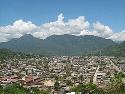 The town Tingo María with the mountains named "The Sleeping Beauty" in the background