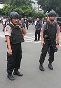 A Brimob officer and a Brimob constable during the 2016 Jakarta attacks
