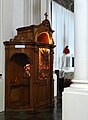 A confessional in the Roman Catholic Visitationist Church with the light on to signal a priest is waiting inside, Warsaw, Poland