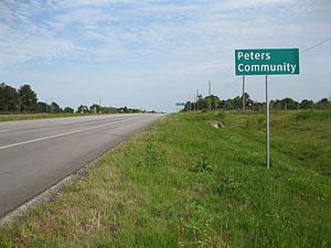Peters Community sign is on State Highway 36, looking to the southeast.