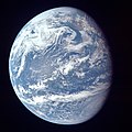 Image 68A view of Earth with its global ocean and cloud cover, which dominate Earth's surface and hydrosphere; at Earth's polar regions, its hydrosphere forms larger areas of ice cover. (from Earth)