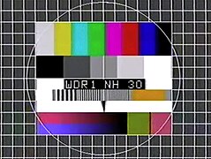 Off-air screen capture of ARD Das Erste test card broadcast by WDR from the Sender Nordhelle [de] transmitter in the 1980s.