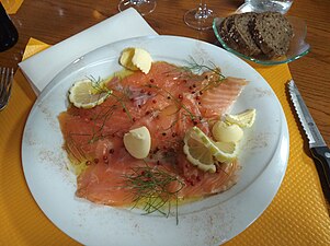 Gravlax is a Nordic dish consisting of salmon that is cured using a mix of salt and sugar.