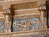 Baroque corbels with mascarons in the Salon d'Hercule (Palace of Versailles, France)