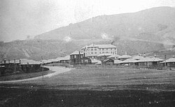 The company town with its hotel, restaurant, bar, houses, and cement processing plant c. the 1920s