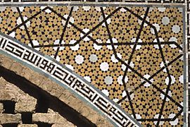 Pentagonal and decagonal Girih-tile pattern on a spandrel from the Darb-i Imam shrine, Isfahan, Iran (1453 C.E.)