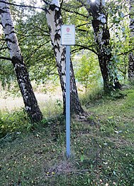 Sign marking the site of the medieval church and cemetery