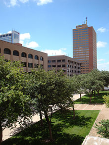 A view of downtown Midland with a 20-story high-rise building toward the background