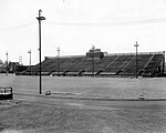 Black and white photo of empty stands of Marquette Stadium