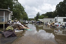 Piles of debris line the side of the roads in flood affected areas one week after the 2016 severe flooding in Baton Rouge