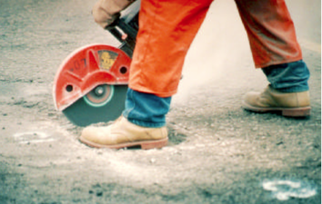 Semi-permanent pothole repair procedure—straightening edges using hand-held pavement saw