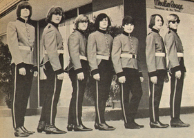 The Palace Guard outside the Moulin Rogue club. Left to right: Chuck McClung, Don Beaudoin, Jon Beaudoin, Dave Beaudoin, Emitt Rhodes, Rick Moser, Mike Conley.