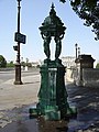 A Wallace fountain, Pont Neuf, (1872), one of 66 such cast-iron fountains placed around Paris by British industrialist and temperance activist Sir Richard Wallace.