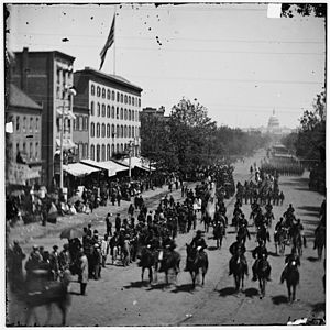 Old American Civil War photo of cavalry parading in Washington, DC