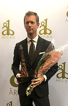 Niklas Natt och Dag receives the 2018 Book of the Year award.