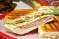 Image 7A Cuban sandwich is a variation of a ham and cheese sandwich that originated among the Cuban workers in the cigar factories in Key West, Florida[1][2]