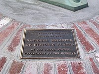 National Register of Historic Places plaque on the first traffic circle in the United States, at the intersection of River and Pleasant streets in Yarmouth, Massachusetts