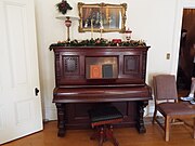 The Niels Petersen House living room piano.