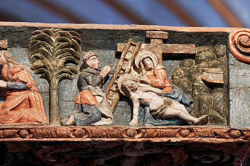 One of the bas-reliefs carved on the rood screen beam: Christ is brought down from the cross
