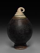 Glazed pottery with brown slip; Bayon period, 12th century