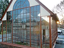 Derry Session House and Enclosure, a log cabin church inside a glass house. Note that both are on the NRHP, in Hershey, Pennsylvania. "Congregations who have churches in glass houses shouldn't be the first to cast stones."