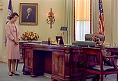 Lyndon B. Johnson and Lady Bird Johnson at the Johnson desk