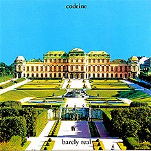 An image of the cover art for the Barely Real EP, featuring an image of Belvedere Palace and its surrounding garden area. At the top of the image in black text in lowercase is text saying "codeine" in lower case. There is text in the same type-face at the bottom of the image in lower case saying "barely real".