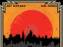 An abstract painting of a large red vinyl record in an orange sky setting over Hollywood in a black outline