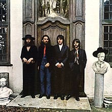 The Beatles – John, George, Paul, and Ringo – in front of an entrance to Tittenhurst Park, John and Yoko's home