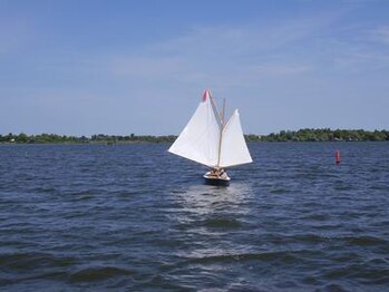 Running: the wind is coming from behind the vessel; the sails are "wing and wing" to be at right angles to the apparent wind.