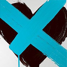 A black heart with a blue "X" painted on top