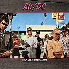 In a motel parking lot, various people dressed in clothing for different job roles with their eyes covered with a black bar. A black dog stands behind a veterinarian. The band's name (labeled as "AC/DC") is on the top in pink text with the album title placed in a white box with black text.