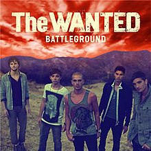 All the band's members standing on grass. The orange sky is seen along with the background. The hill is seen in the picture. Along with that, we see the band's name and the album's title underneath in white. From left to right, we see Jay McGuinness, Nathan Sykes, Max George, Siva Kaneswaran, and Tom Parker.