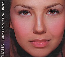 Close of Thalía's face with the song's title positioned on the left