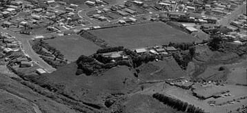 Aerial Image by White Aviation of Moturoa AFC's home ground on Boxing Day 1984. In the bottom right is the Ngamotu Tavern, opened 1972 closed approximately 2000