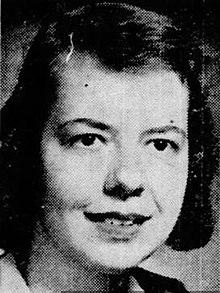 The face of a young white woman, in a newspaper photograph from 1954.